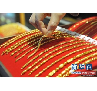 金价新年飙涨9% “货币战”成市场推手